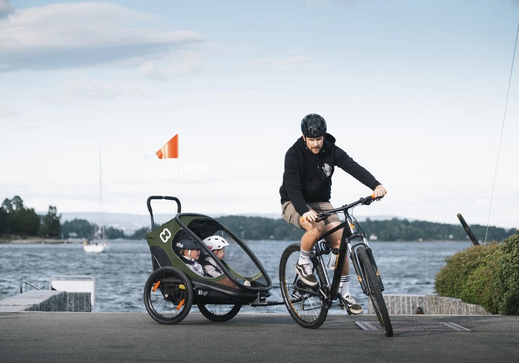 Comment transporter un enfant à vélo : remorque, siège ou cargo ?