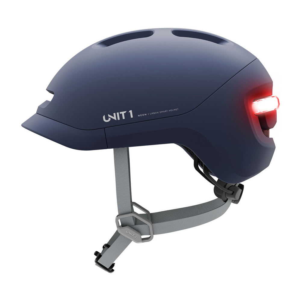 Casque connecté Unit 1 NEON Mips, coloris Steel Blue, vue de profil, feu arrière allumé
