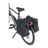 Sacoche double vélo Basil SoHo Nordlicht MIK 41 L coloris Noir nuit – bande LED Nordlicht allumée