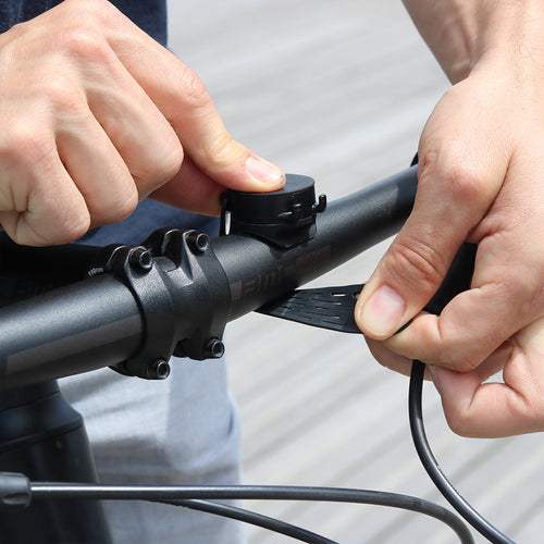 Support téléphone magnétique universel Shapeheart serré sur le guidon d'un vélo